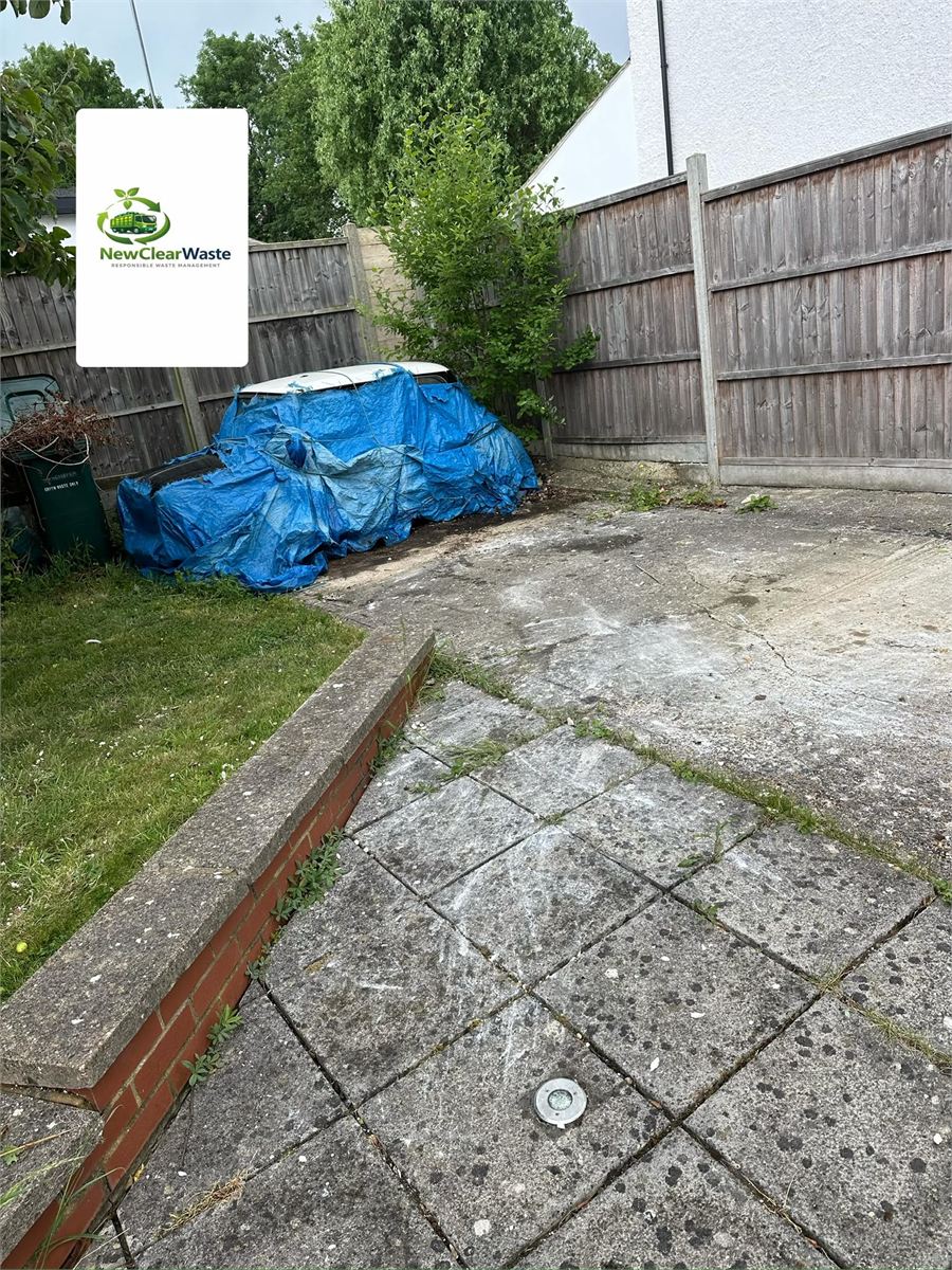 Garden hardstanding cleared after building waste removal