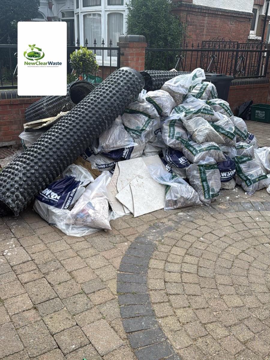 Bagged rubble and drainage membrane ready for licensed disposal